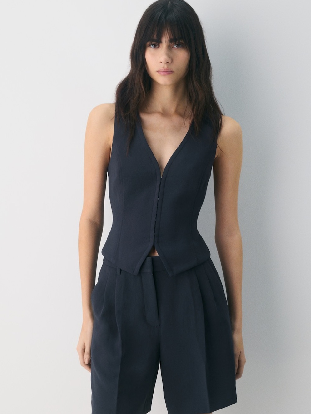Aritzia Sleeveless V-Neck Bodysuit in Navy